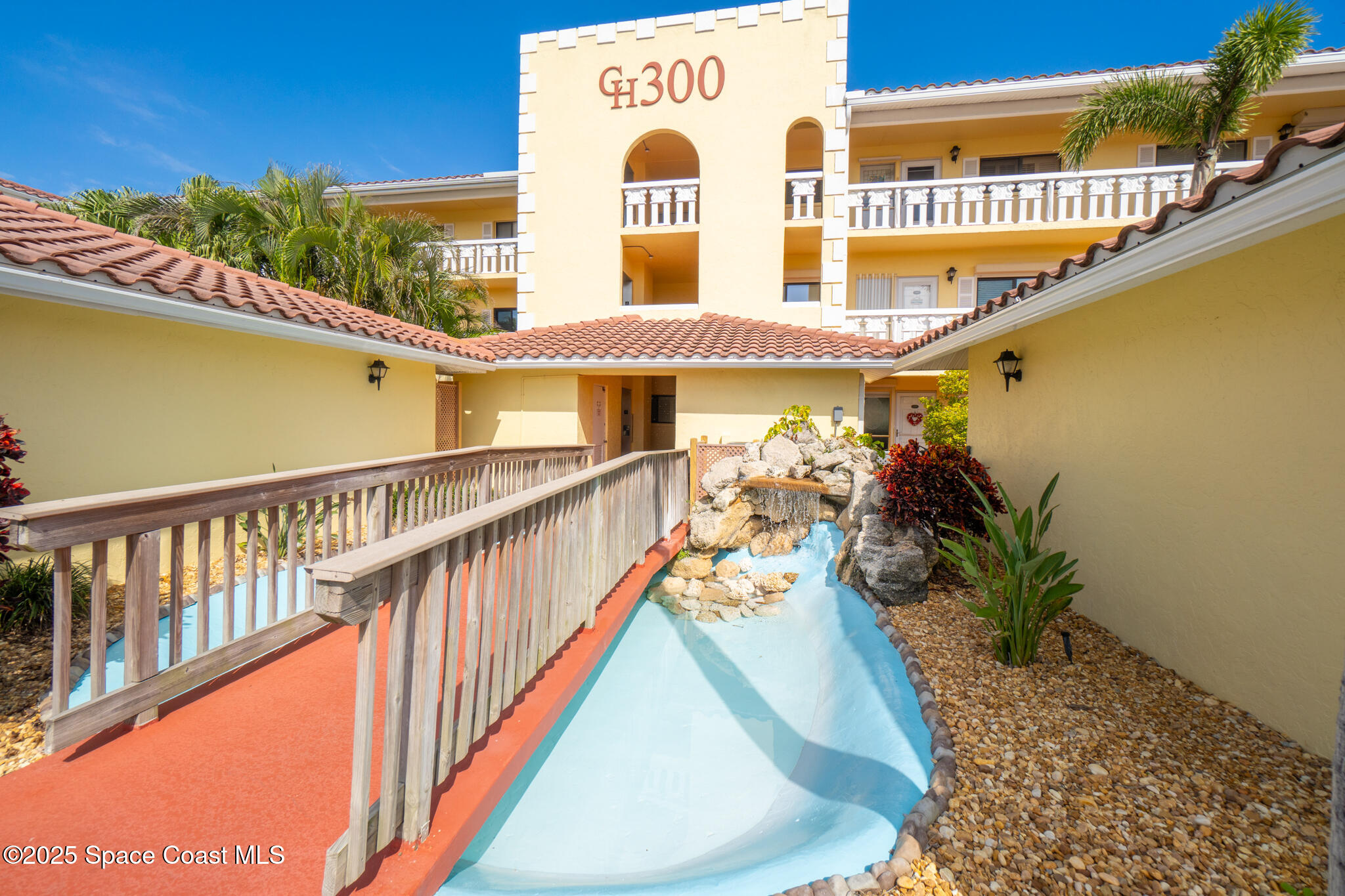 300 South Banana River Boulevard, Unit 301 Cocoa Beach, FL 32931 - Photo 3 of 44 Colonial House Entrance