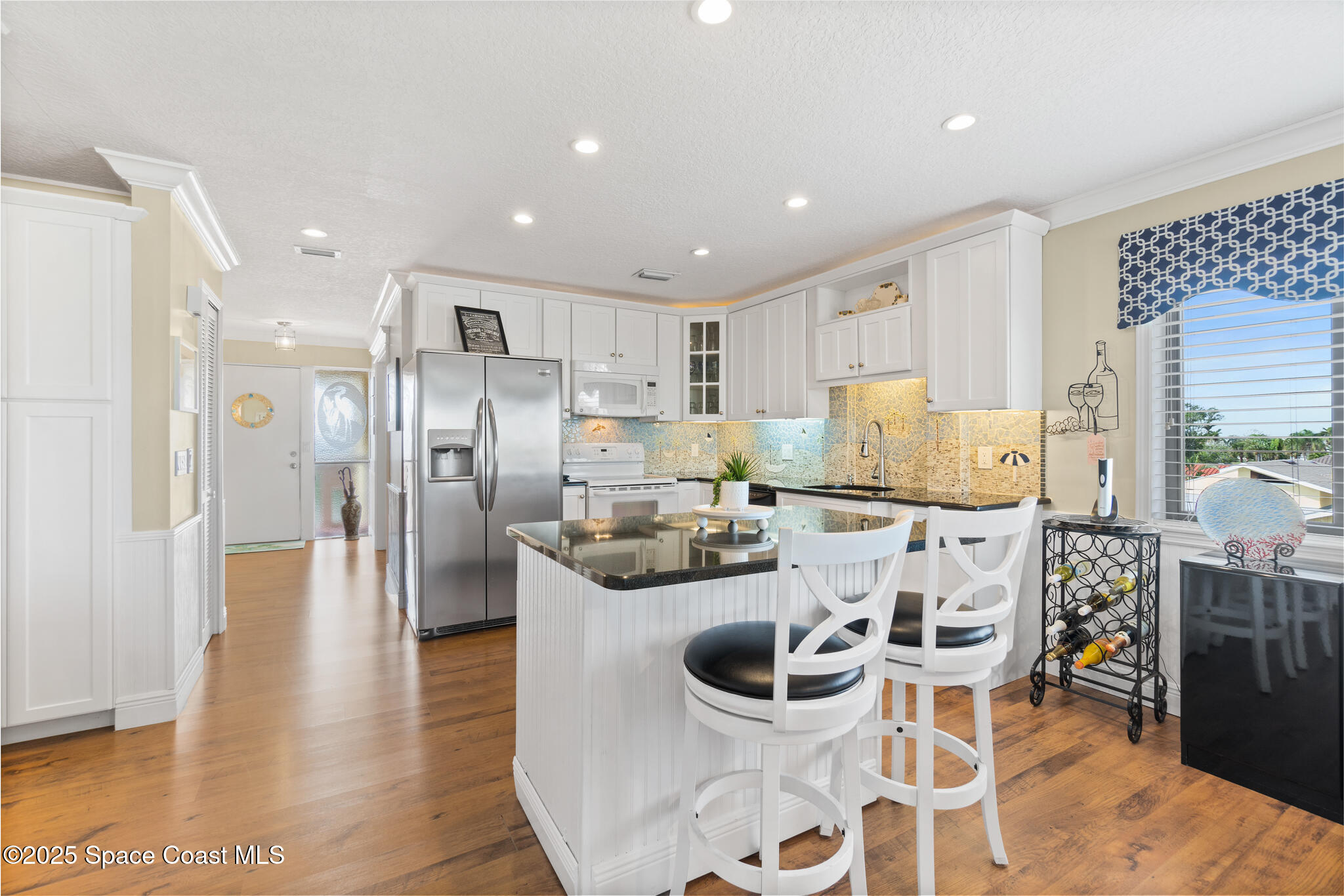 300 South Banana River Boulevard, Unit 301 Cocoa Beach, FL 32931 - Photo 4 of 44 Kitchen Island