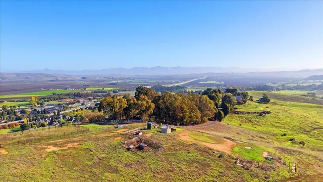 a view of an ocean and a mountain