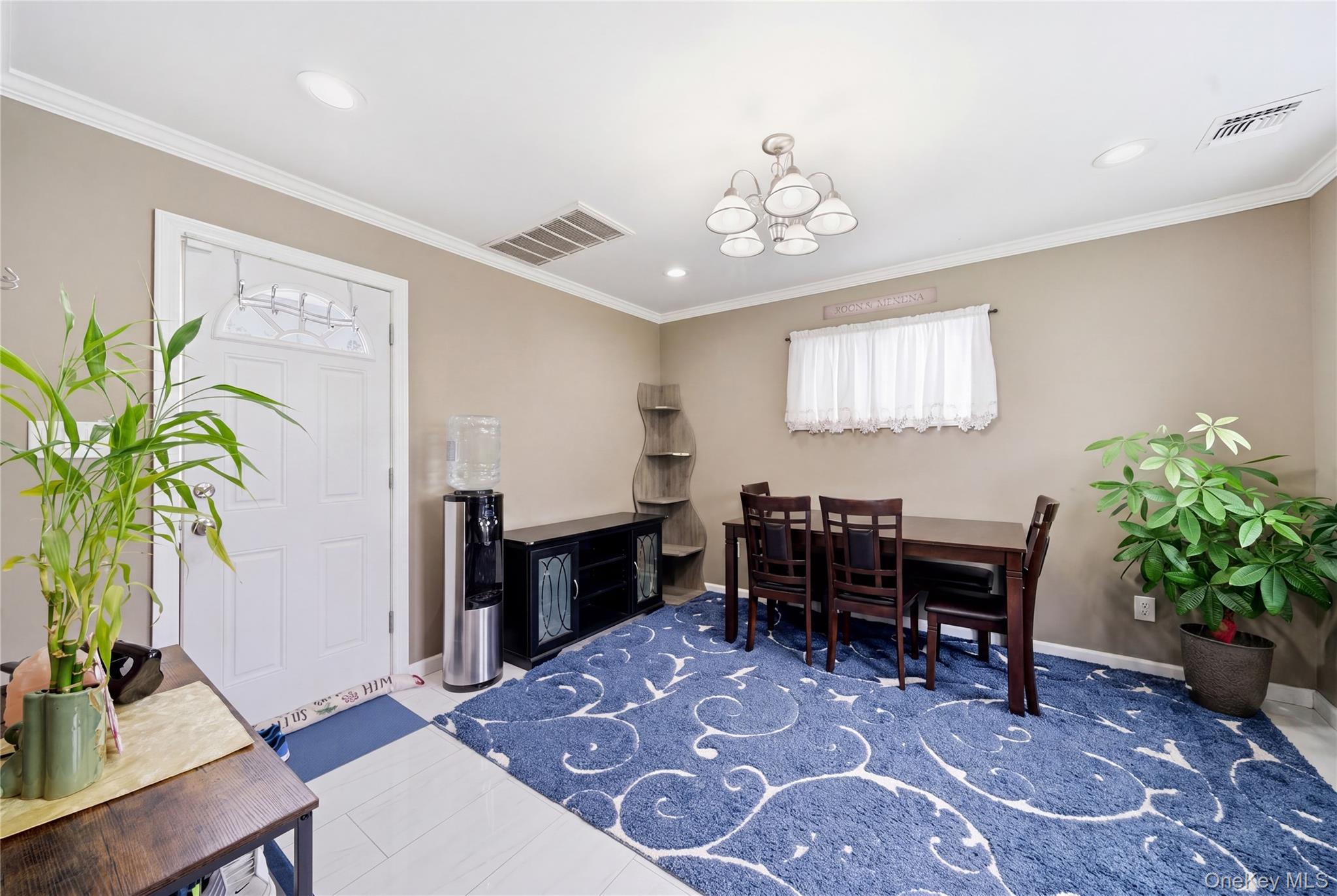 50 Ridge Lane Levittown, NY 11756 - Photo 8 of 27 a view of a dining room with furniture