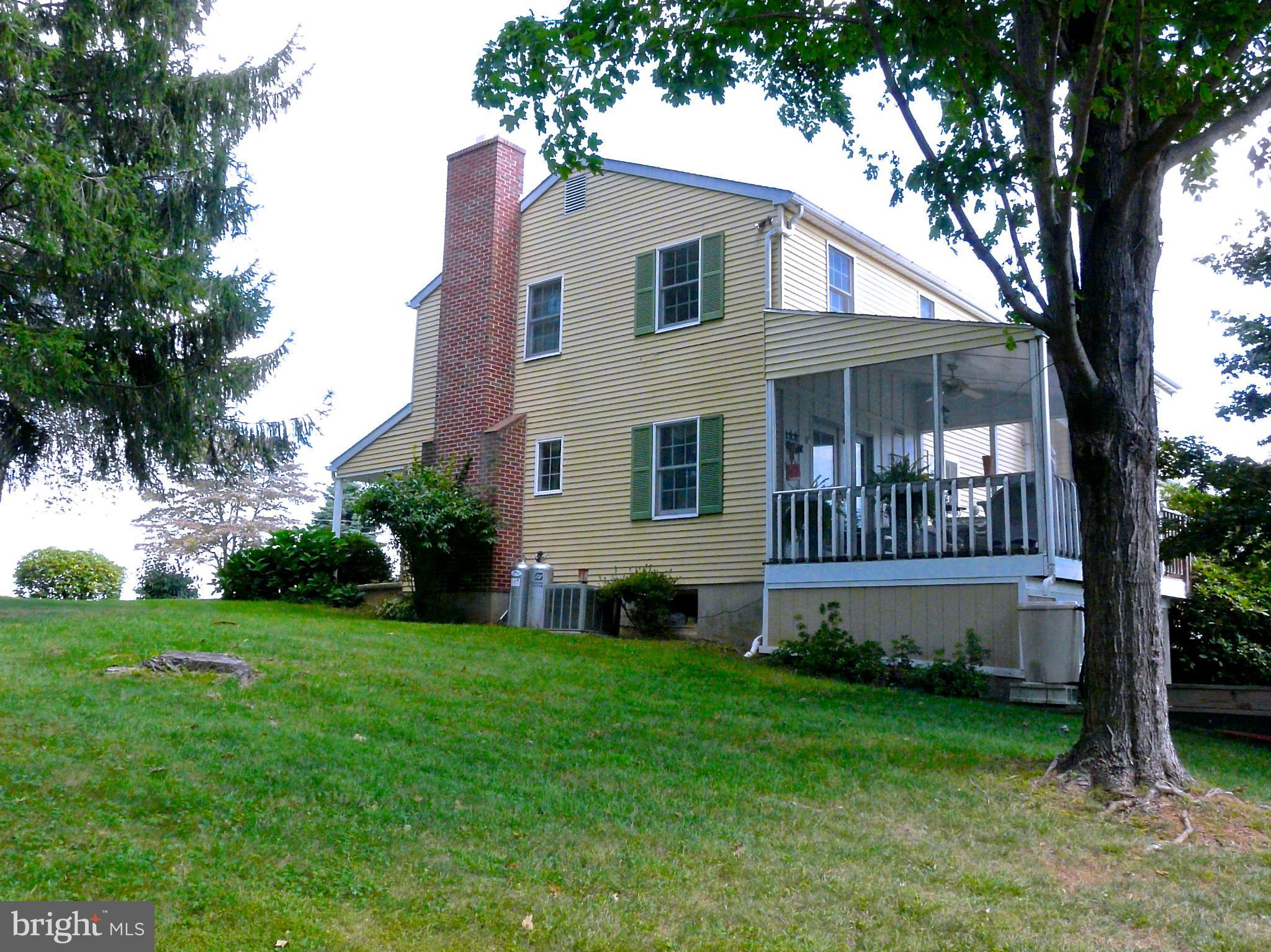16361 Markoe Road Monkton, MD 21111 - Photo 7 of 30 side view of screened porch