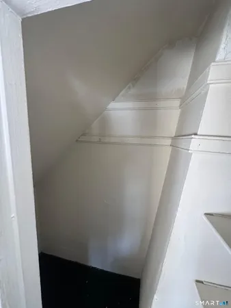 a view of small space with racks on the wall