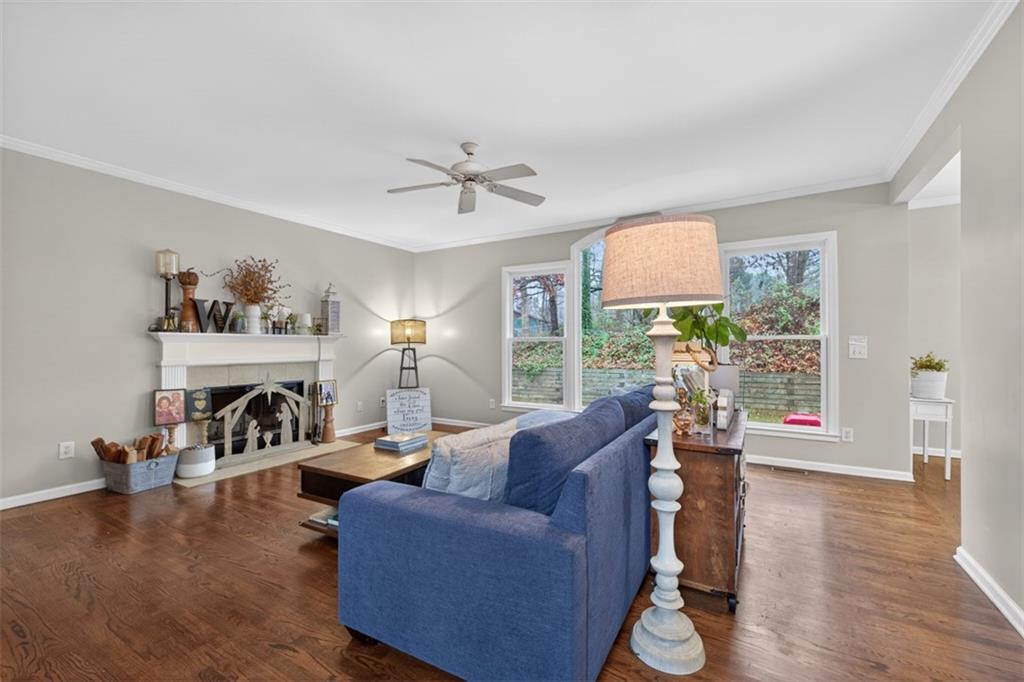 2641 Hillgrove Drive Dacula, GA 30019 - Photo 14 of 57 a living room with furniture and a large window