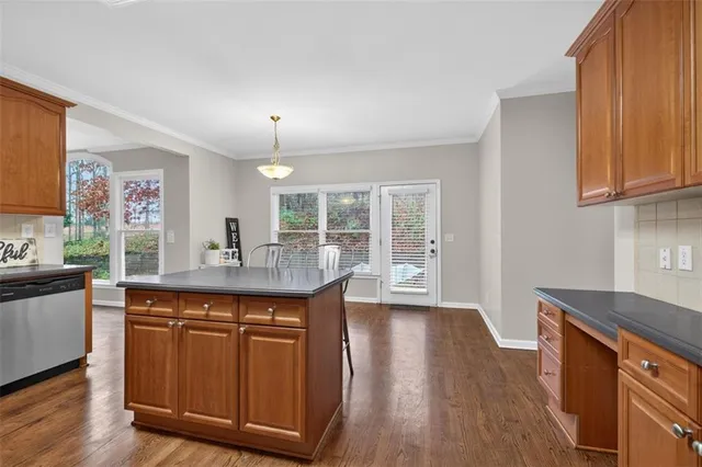 a bedroom with a bed chair and window