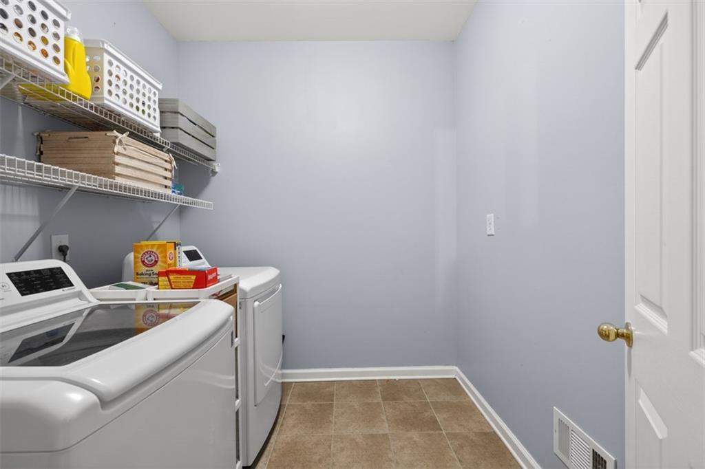 2641 Hillgrove Drive Dacula, GA 30019 - Photo 25 of 57 a room with storage and utility