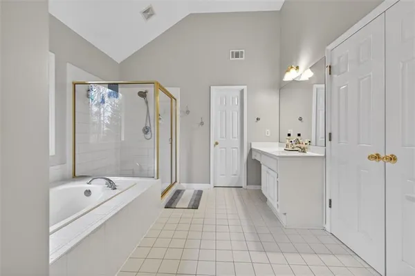 a bedroom with a bed and a cabinets