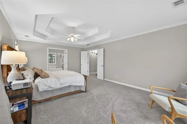 a bedroom with a bed and a cabinets