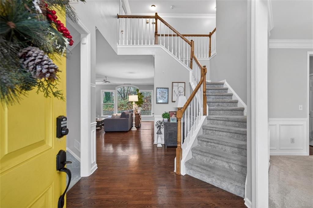 2641 Hillgrove Drive Dacula, GA 30019 - Photo 4 of 57 a view of entryway and hall with wooden floor