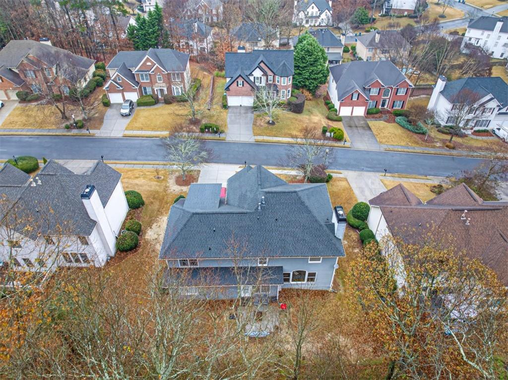 2641 Hillgrove Drive Dacula, GA 30019 - Photo 48 of 57 an aerial view of residential houses with outdoor space