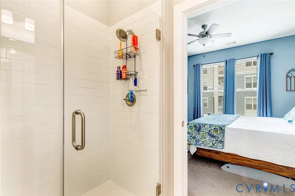 a kitchen with stainless steel appliances granite countertop a stove and a wooden floors