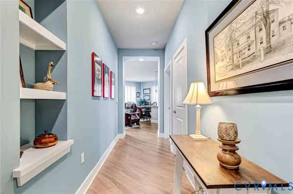 a large kitchen with kitchen island a sink stainless steel appliances and cabinets