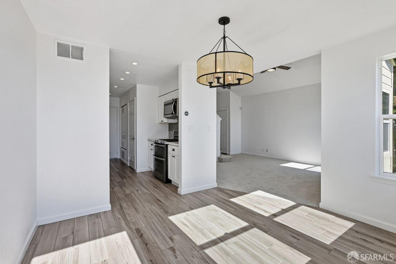 59 Kiska Road San Francisco, CA 94124 - Photo 14 of 46 a view of a chandelier in a room