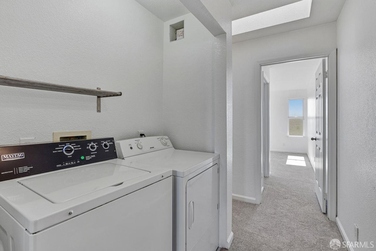59 Kiska Road San Francisco, CA 94124 - Photo 34 of 46 a utility room with dryer and washer
