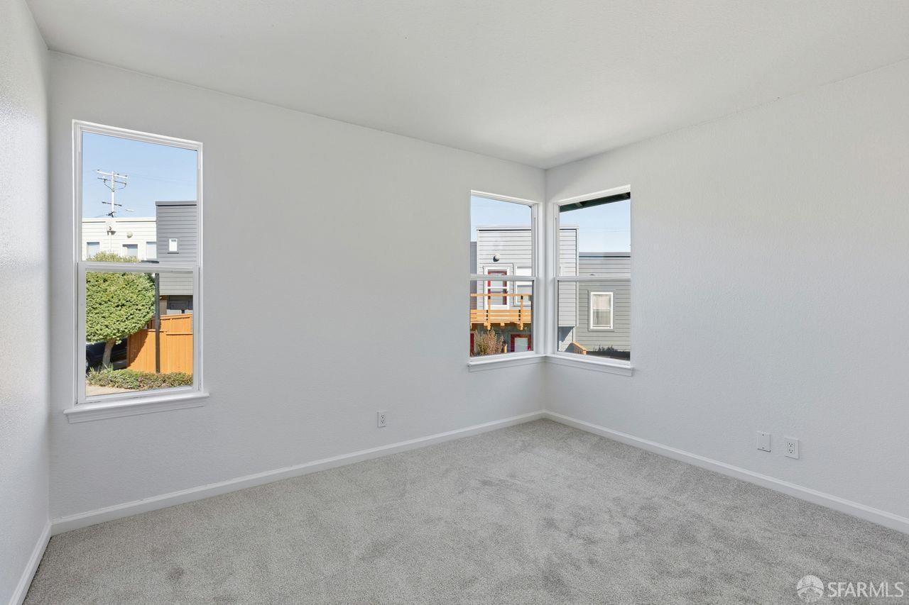 59 Kiska Road San Francisco, CA 94124 - Photo 37 of 46 an empty room with windows