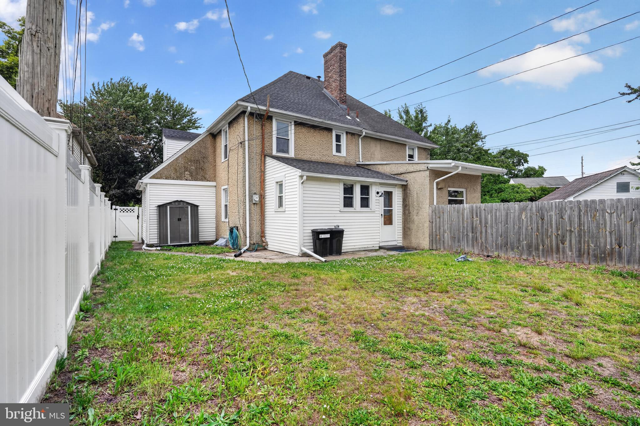 223 Noreg Place Brooklawn, NJ 08030 - Photo 35 of 36 a front view of a house with garden