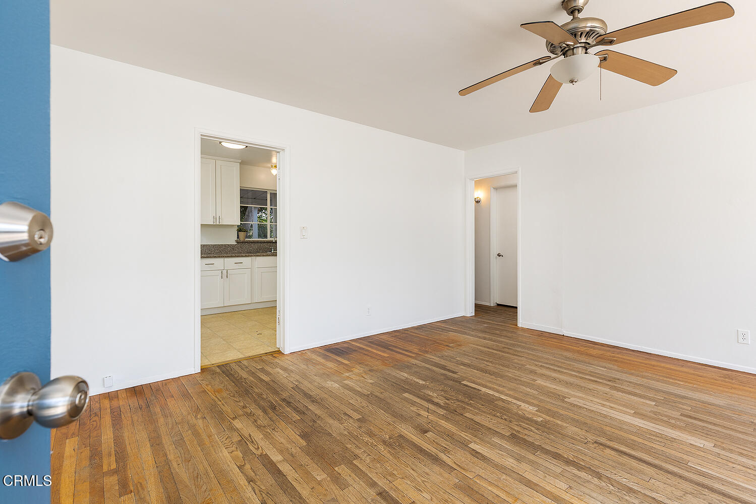 114 South Canyon Boulevard Monrovia, CA 91016 - Photo 15 of 32 a view of a livingroom with a chandelier fan and wooden floor