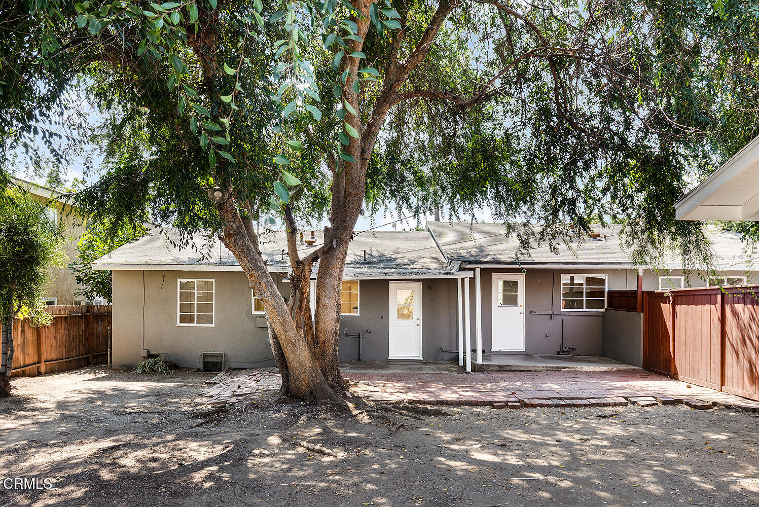 114 South Canyon Boulevard Monrovia, CA 91016 - Photo 28 of 32 a front view of a house with a tree