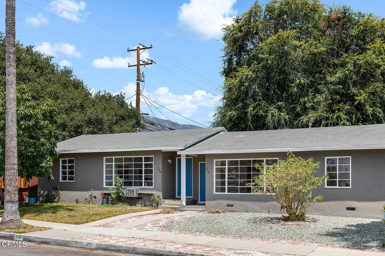 114 South Canyon Boulevard Monrovia, CA 91016 - Photo 32 of 32 a front view of a house with garden