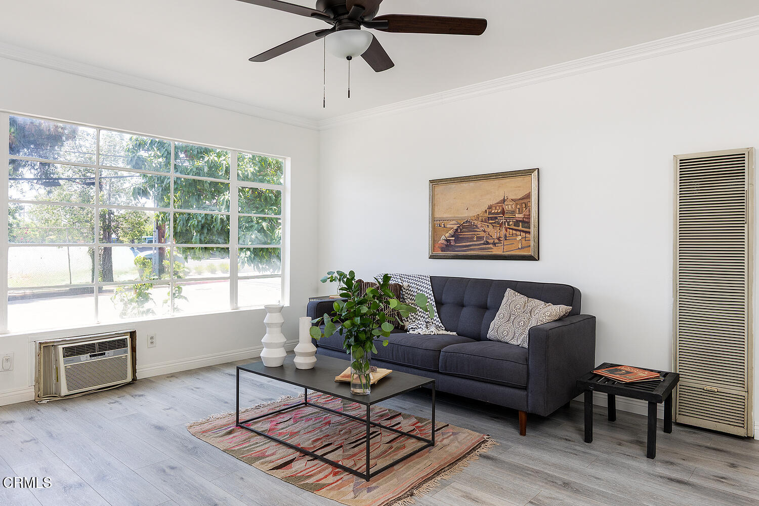 114 South Canyon Boulevard Monrovia, CA 91016 - Photo 6 of 32 a living room with furniture a ceiling fan and a window