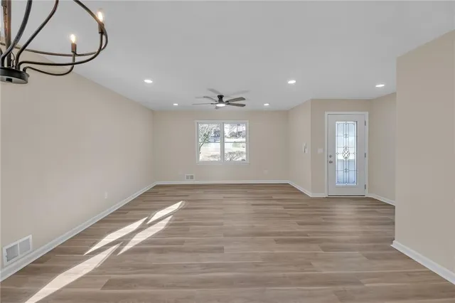 a view of an empty room and window