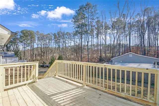 a view of a wooden roof deck