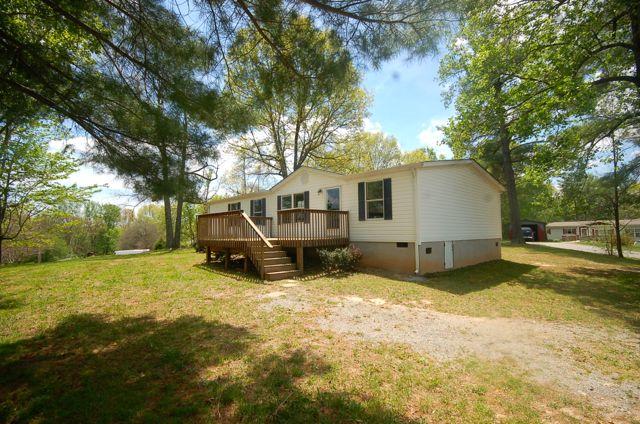 135 Hopkins Road Rocky Mount, VA 24151 - Photo 1 of 21 a view of a house with a yard