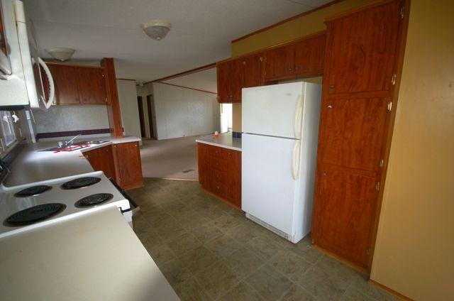 135 Hopkins Road Rocky Mount, VA 24151 - Photo 13 of 21 a room with furniture and a refrigerator