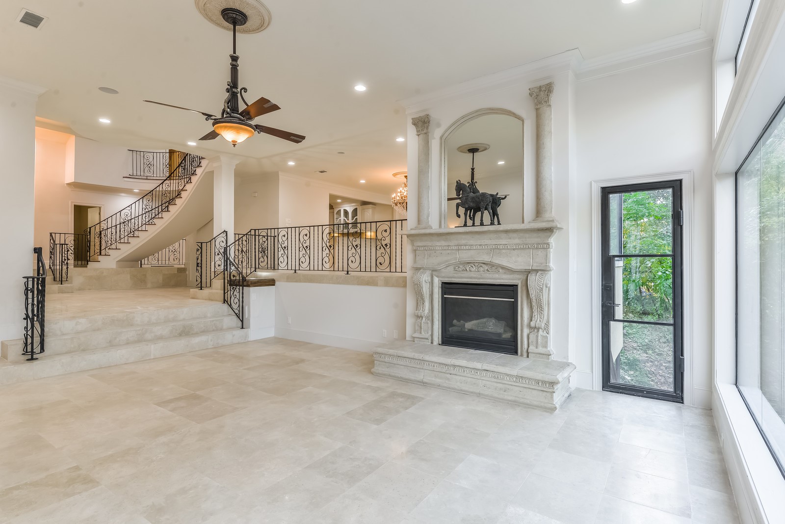 15 West Shady Lane, Unit B Houston, TX 77063 - Photo 5 of 19 a view of a livingroom with a fireplace and window