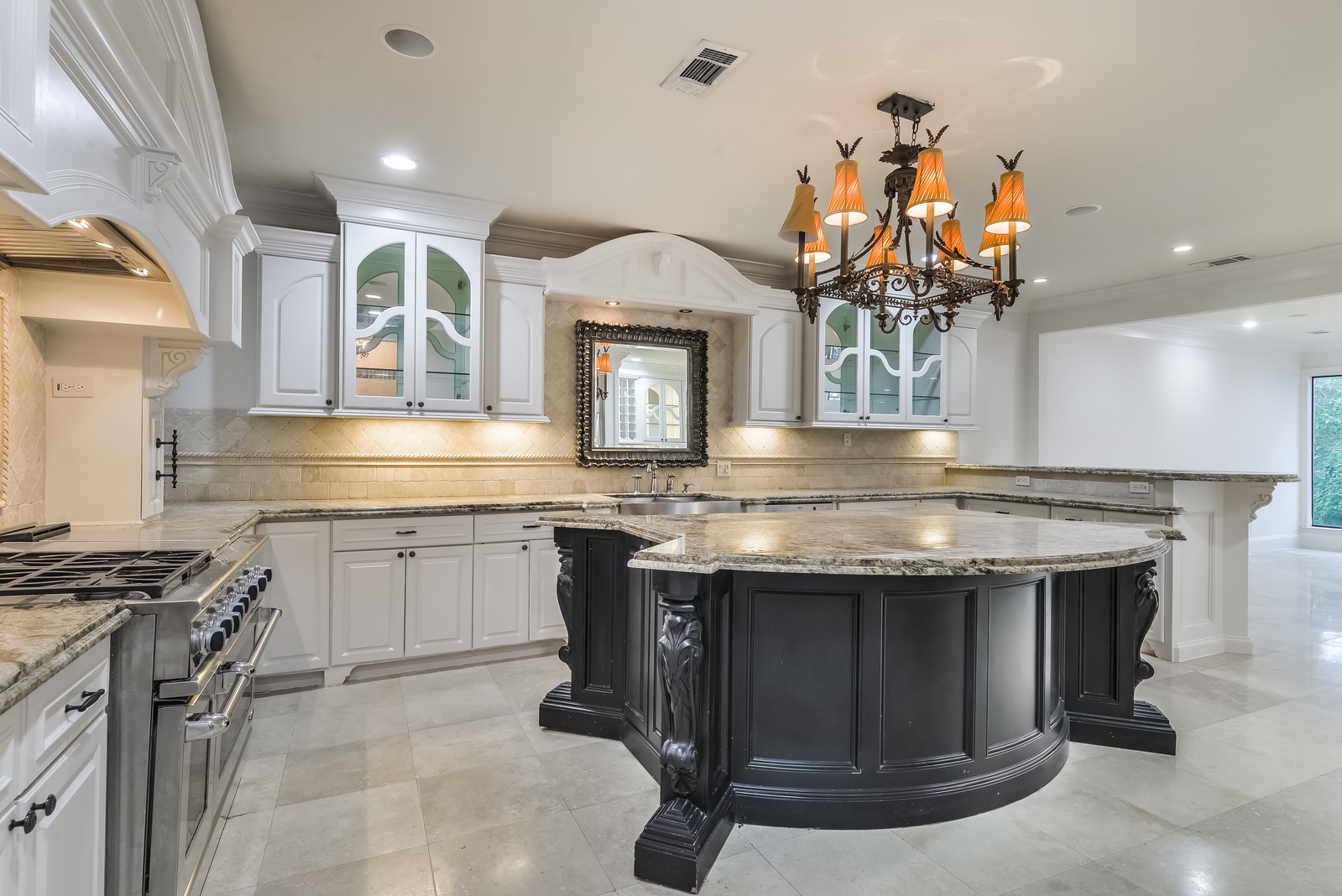 15 West Shady Lane, Unit B Houston, TX 77063 - Photo 8 of 19 a kitchen with stainless steel appliances granite countertop a stove and a sink