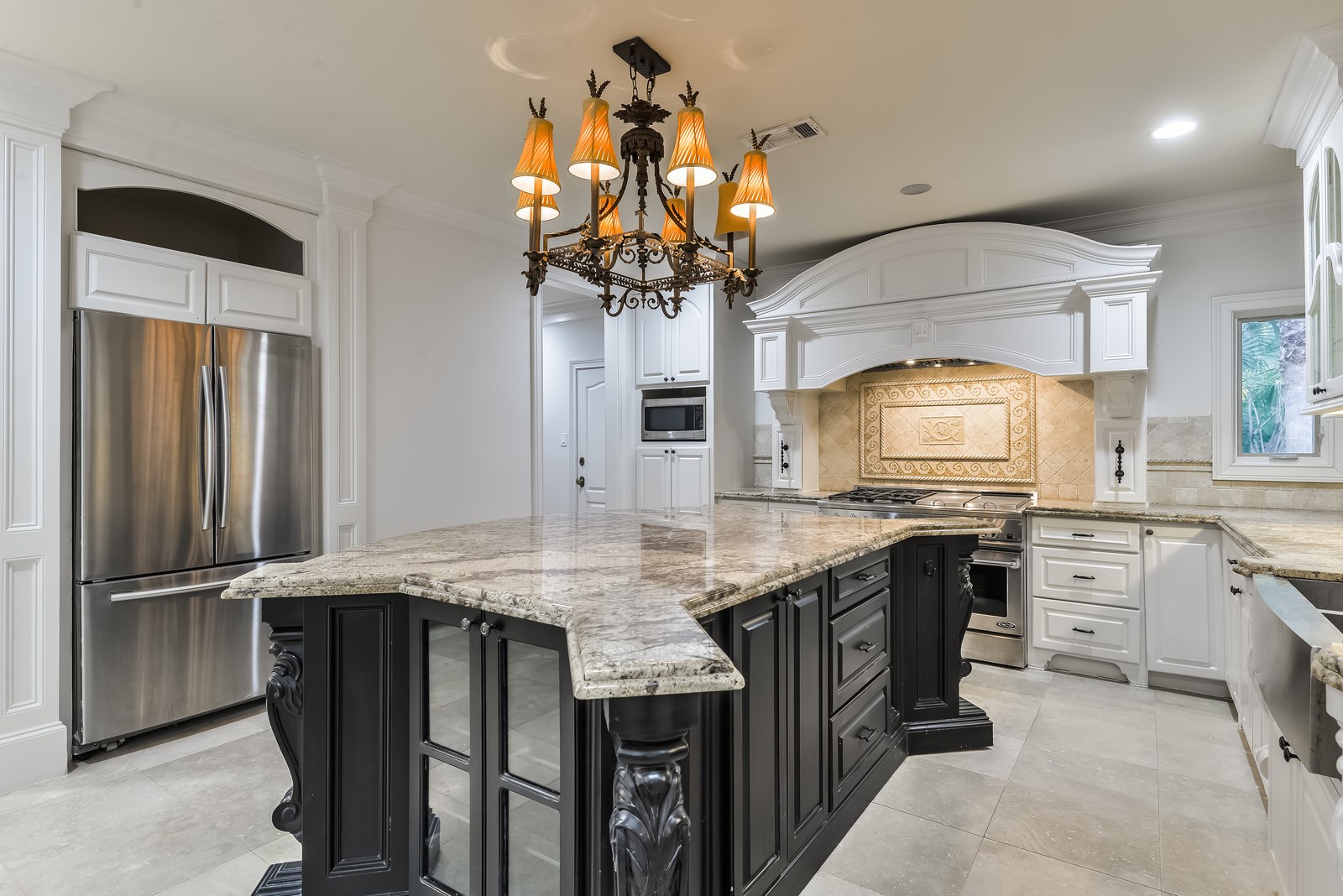 15 West Shady Lane, Unit B Houston, TX 77063 - Photo 9 of 19 a kitchen with stainless steel appliances granite countertop a sink a stove and a refrigerator