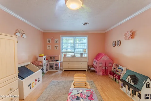 a room with furniture and a window