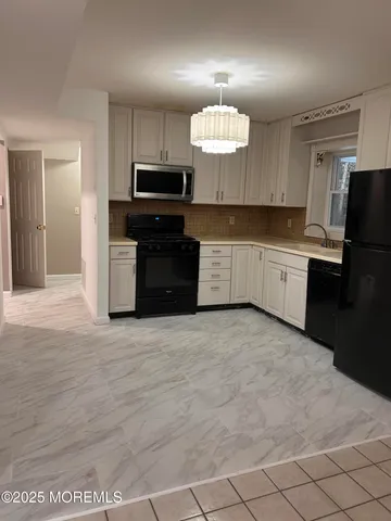 a view of a livingroom with a fireplace
