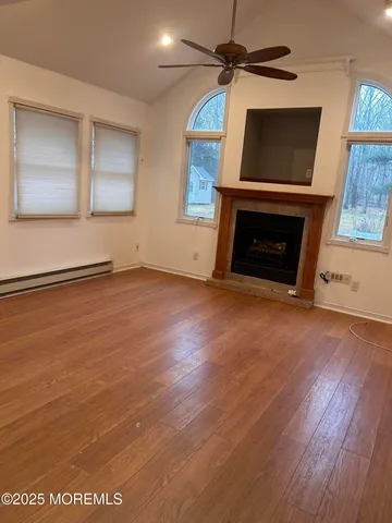 a white toilet sitting next to a sink