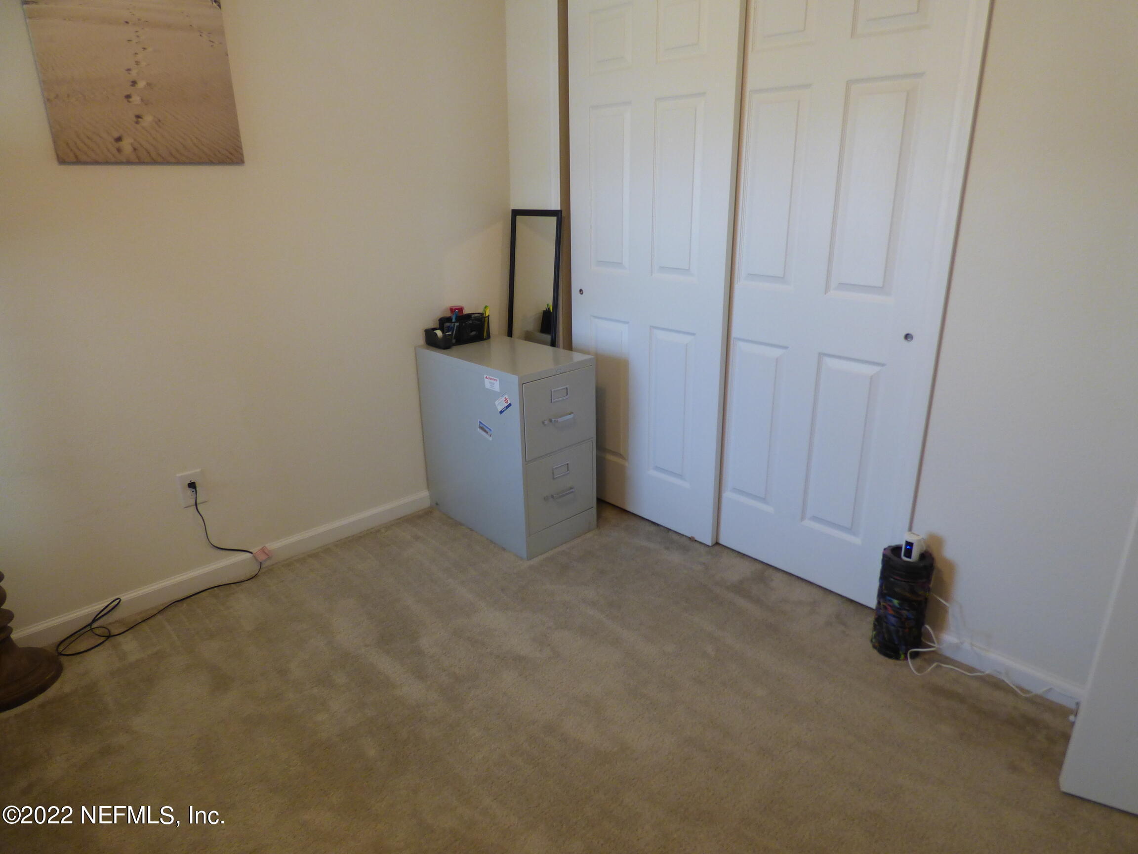 313 Bluejack Lane St. Augustine, FL 32095 - Photo 26 of 46 a view of a room with a door