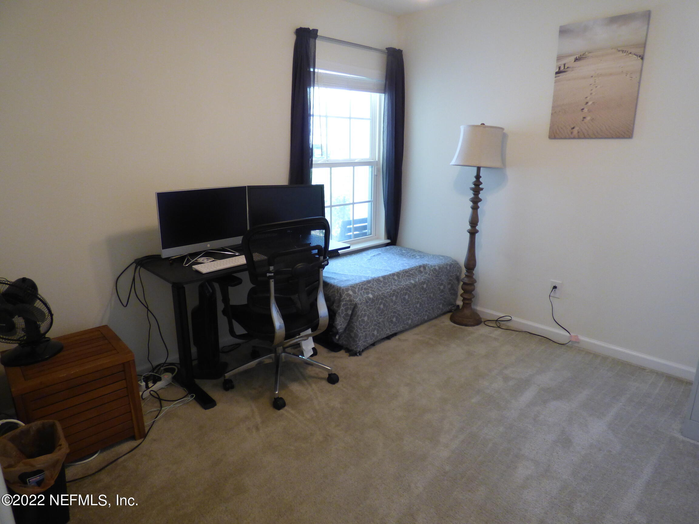 313 Bluejack Lane St. Augustine, FL 32095 - Photo 27 of 46 a bedroom with bed and a window