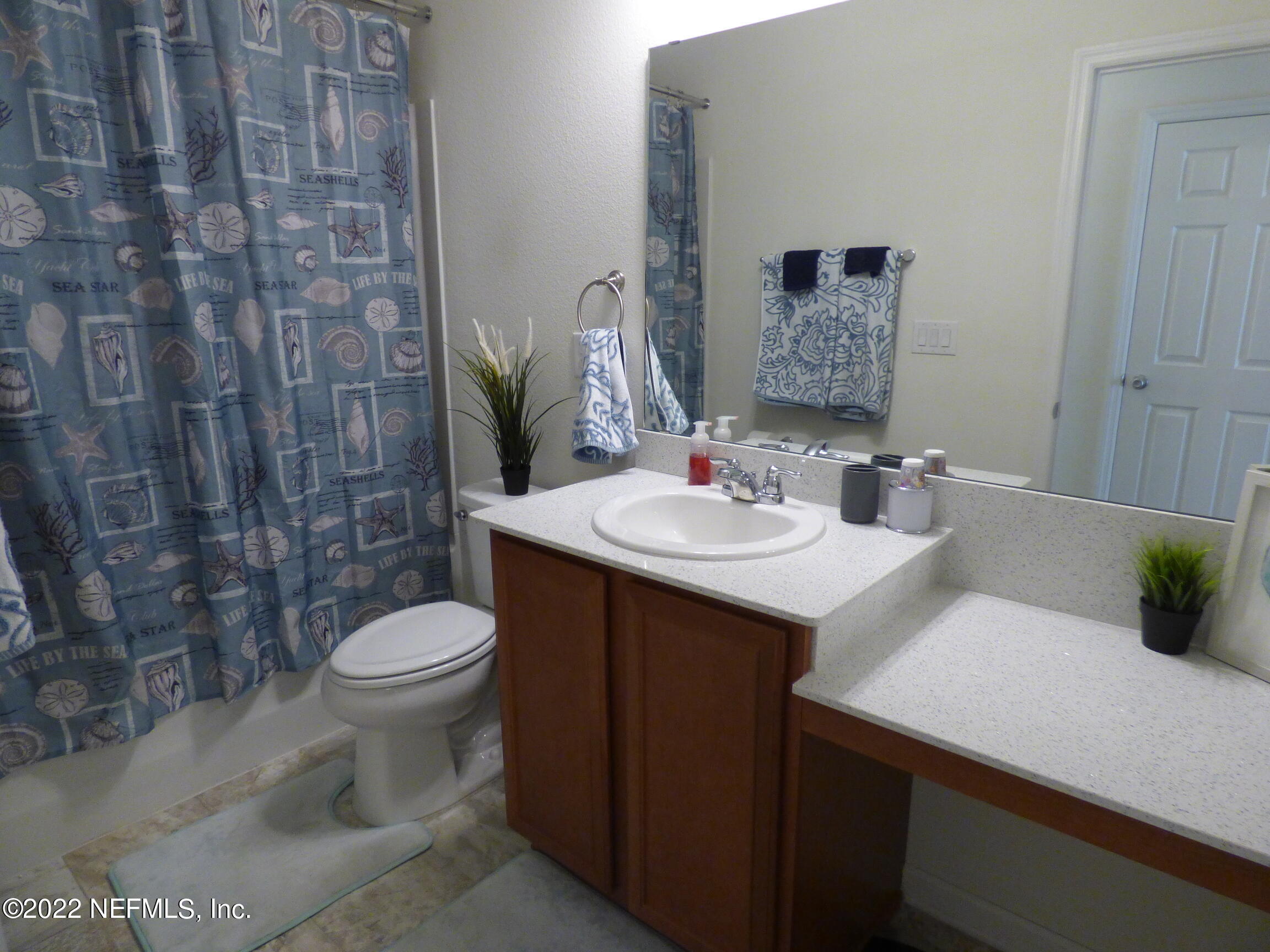 313 Bluejack Lane St. Augustine, FL 32095 - Photo 28 of 46 a bathroom with a sink and a toilet