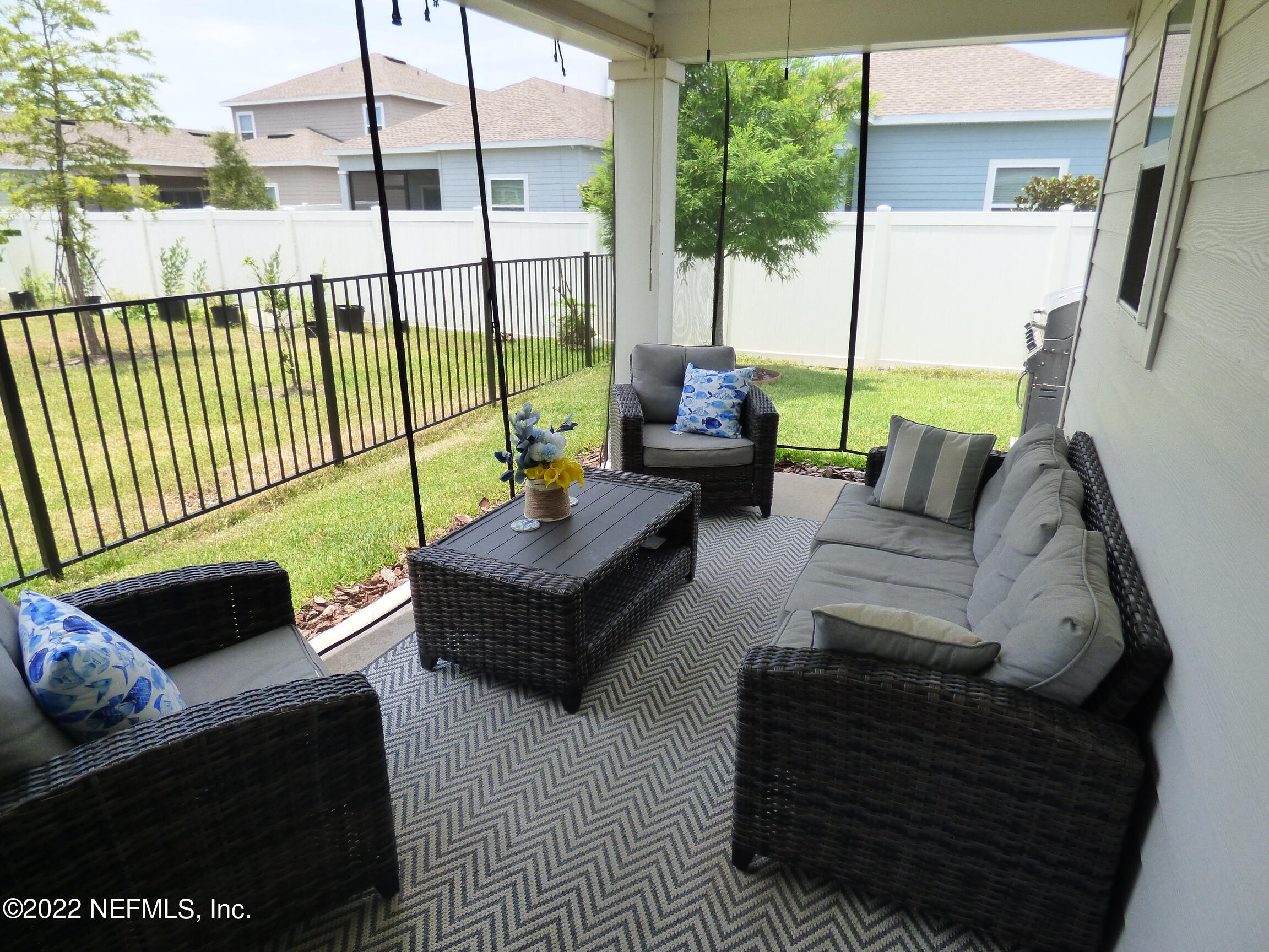 313 Bluejack Lane St. Augustine, FL 32095 - Photo 29 of 46 a building outdoor space with patio couch