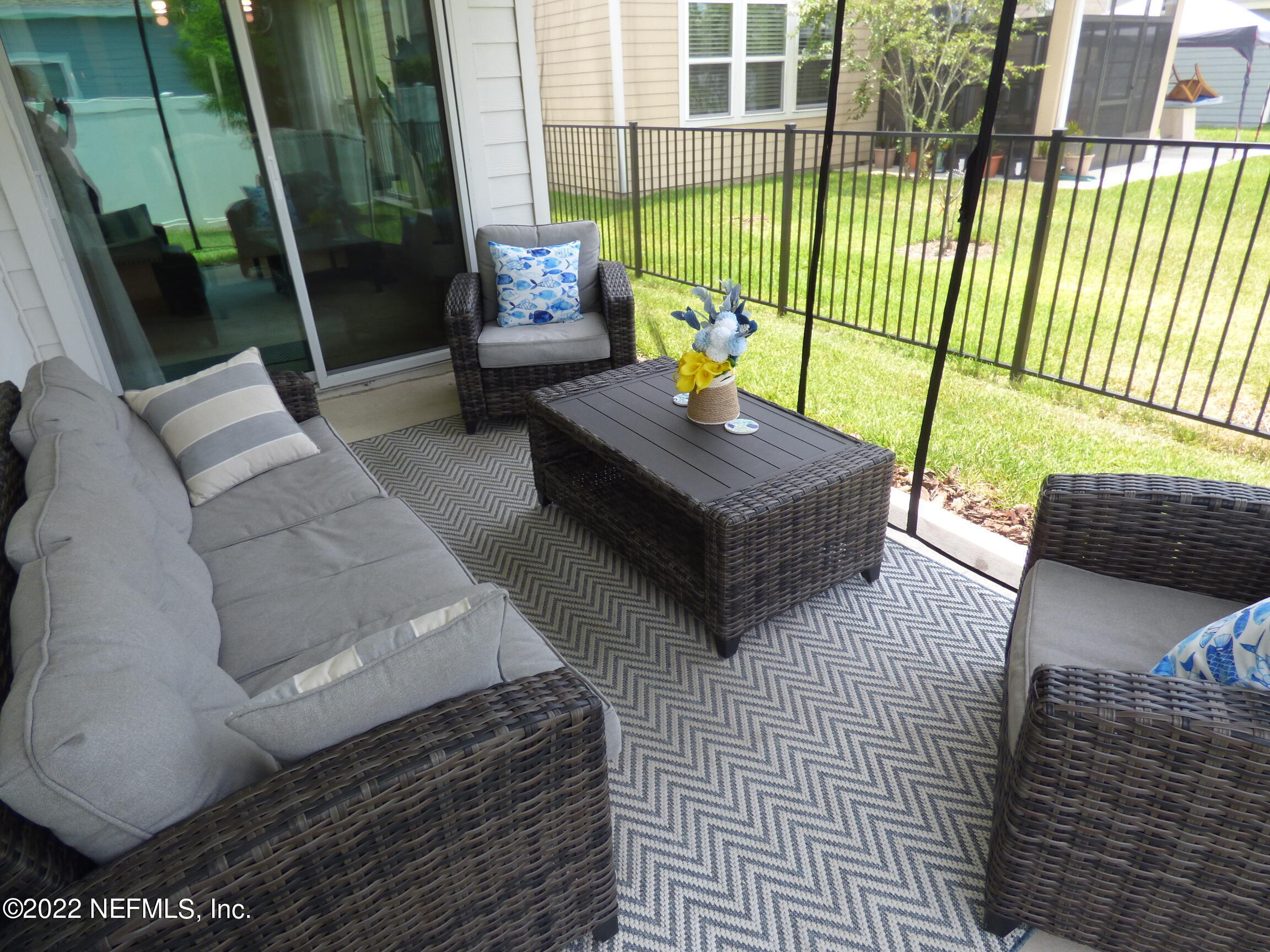 313 Bluejack Lane St. Augustine, FL 32095 - Photo 30 of 46 a building outdoor space with seating