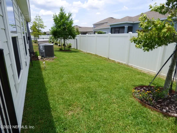 a view of a backyard with garden