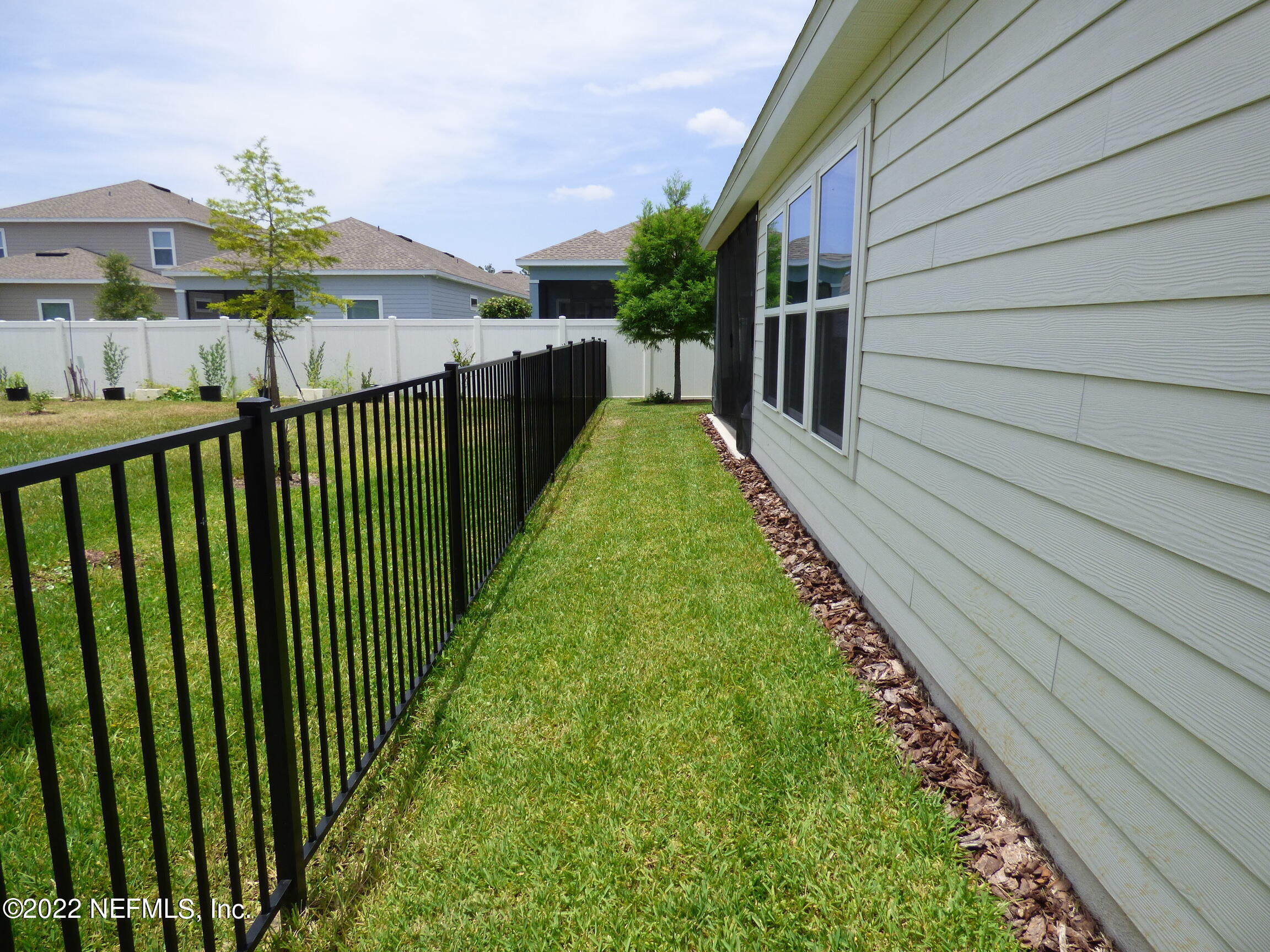 313 Bluejack Lane St. Augustine, FL 32095 - Photo 34 of 46 a view of a garden from a balcony