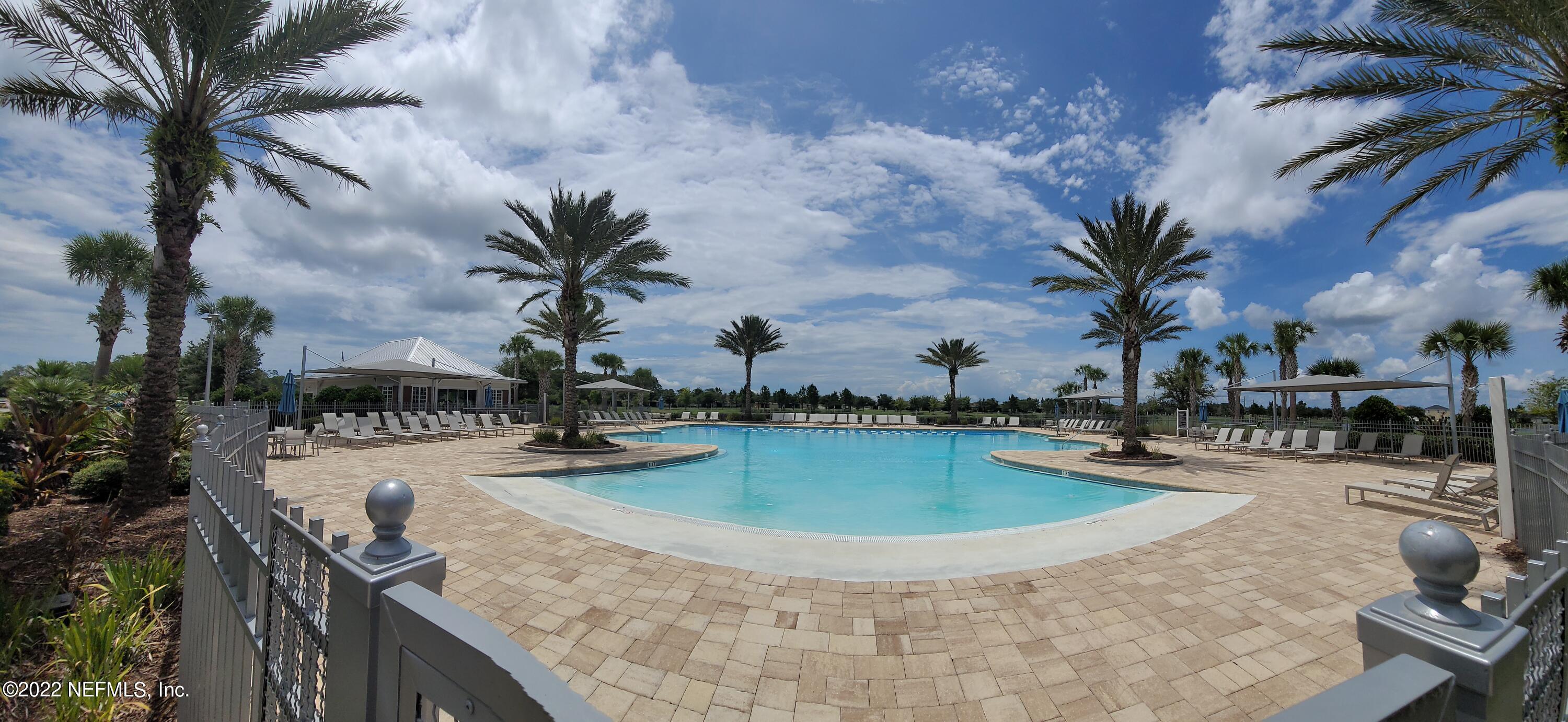 313 Bluejack Lane St. Augustine, FL 32095 - Photo 36 of 46 a view of a swimming pool with a patio