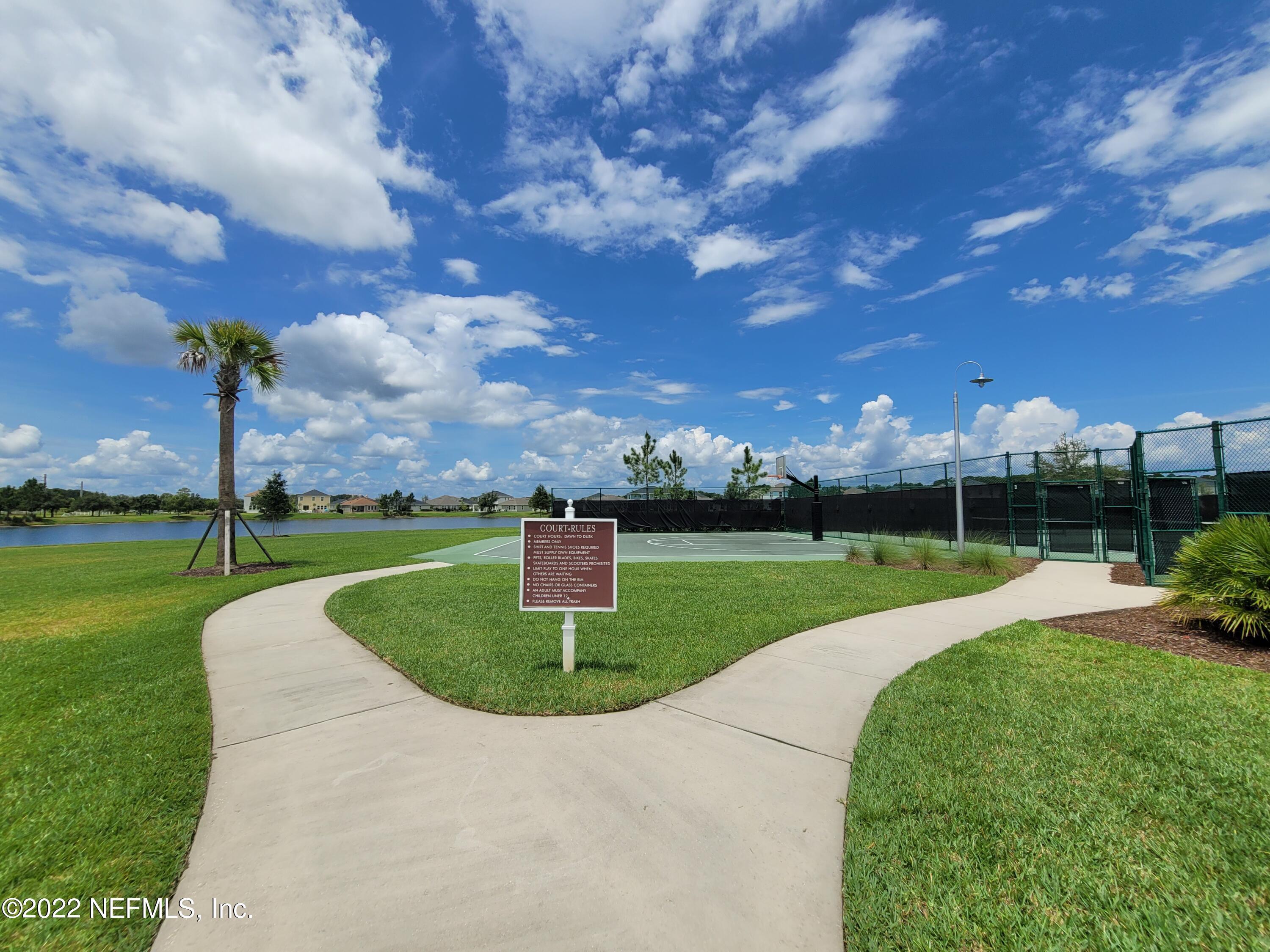 313 Bluejack Lane St. Augustine, FL 32095 - Photo 40 of 46 a view of a golf course with a fountain