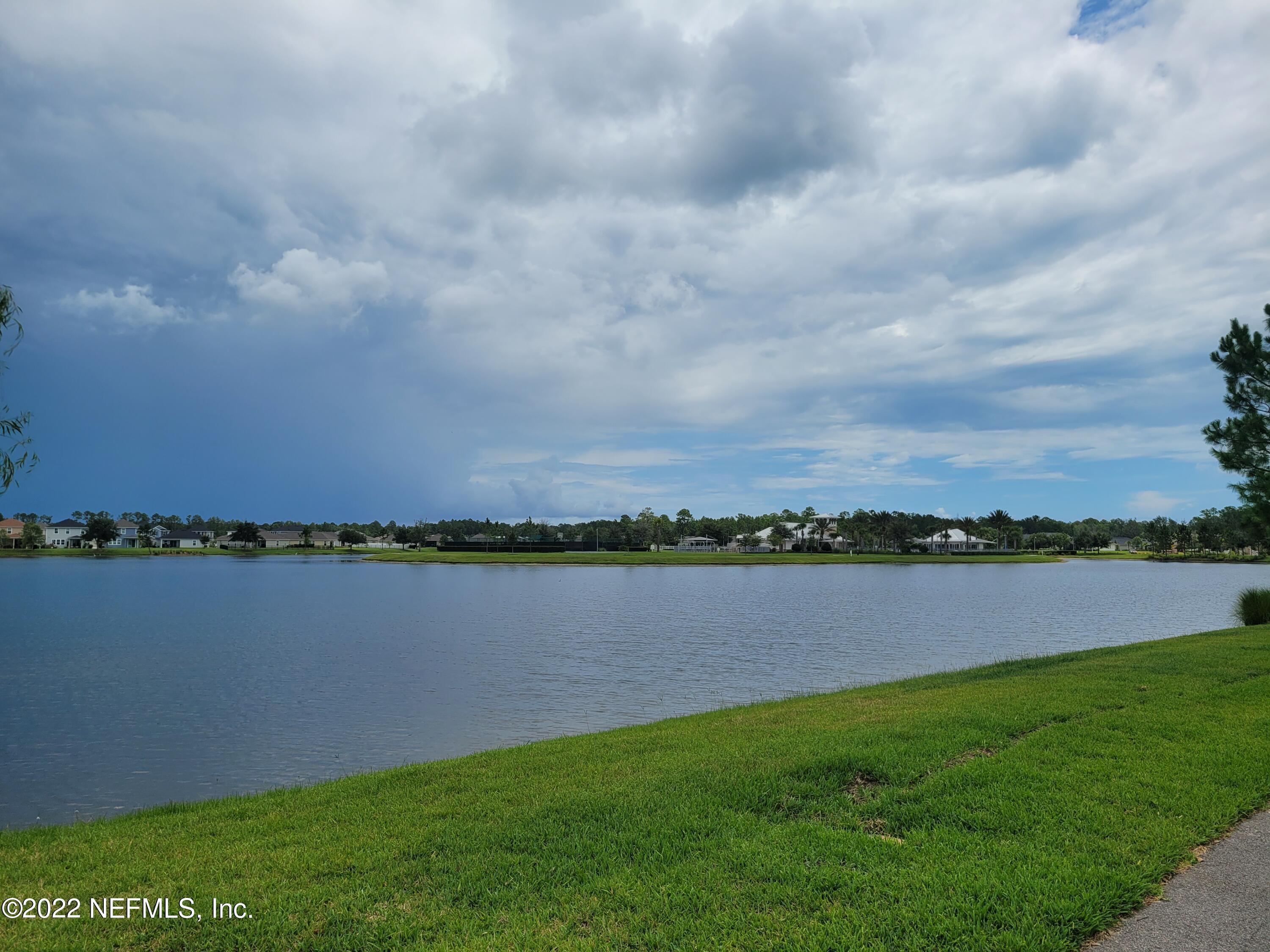 313 Bluejack Lane St. Augustine, FL 32095 - Photo 43 of 46 a view of a lake with a city view