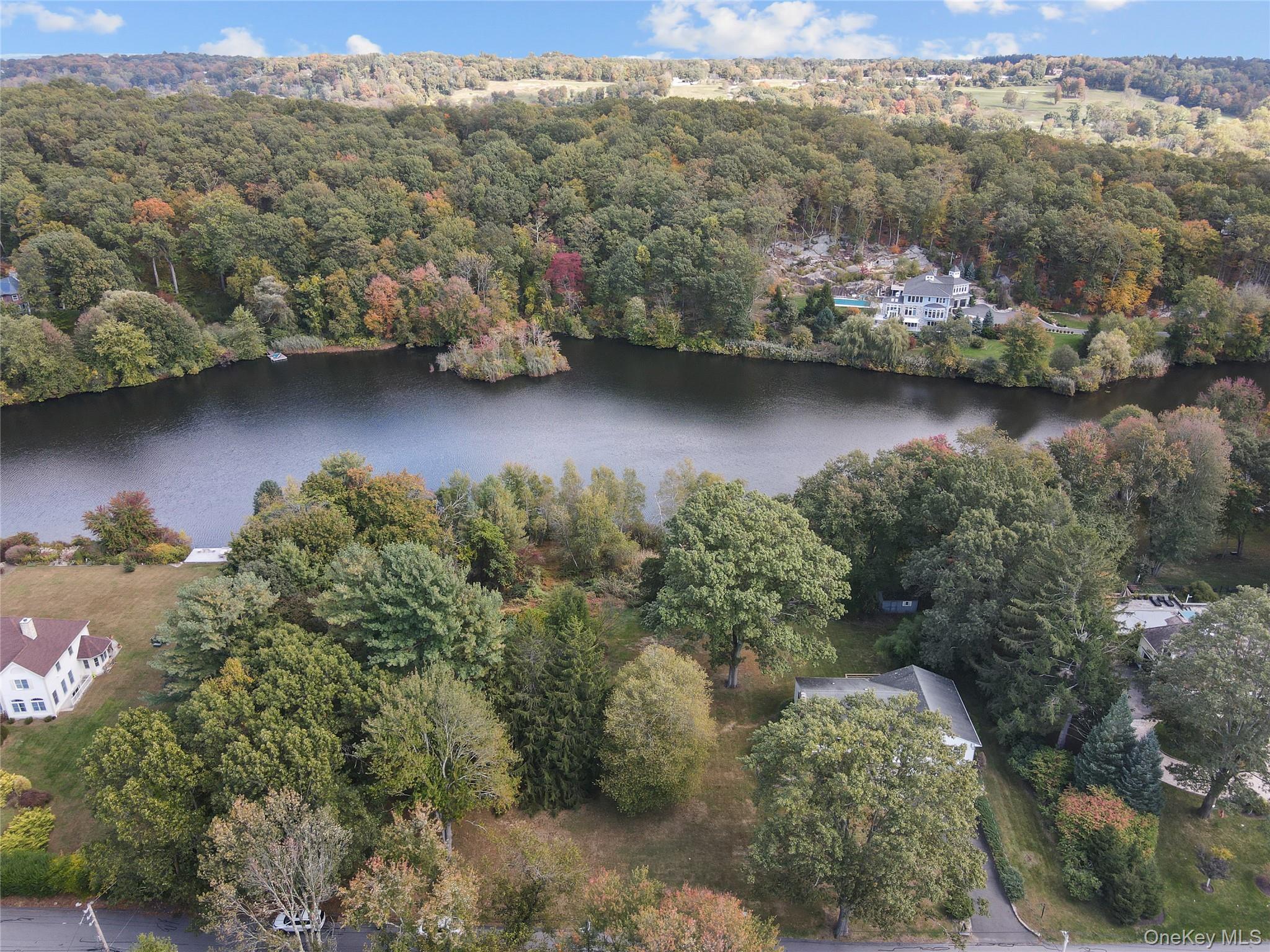 76 Byram Ridge Road Armonk, NY 10504 - Photo 11 of 11 a view of a lake with a mountain