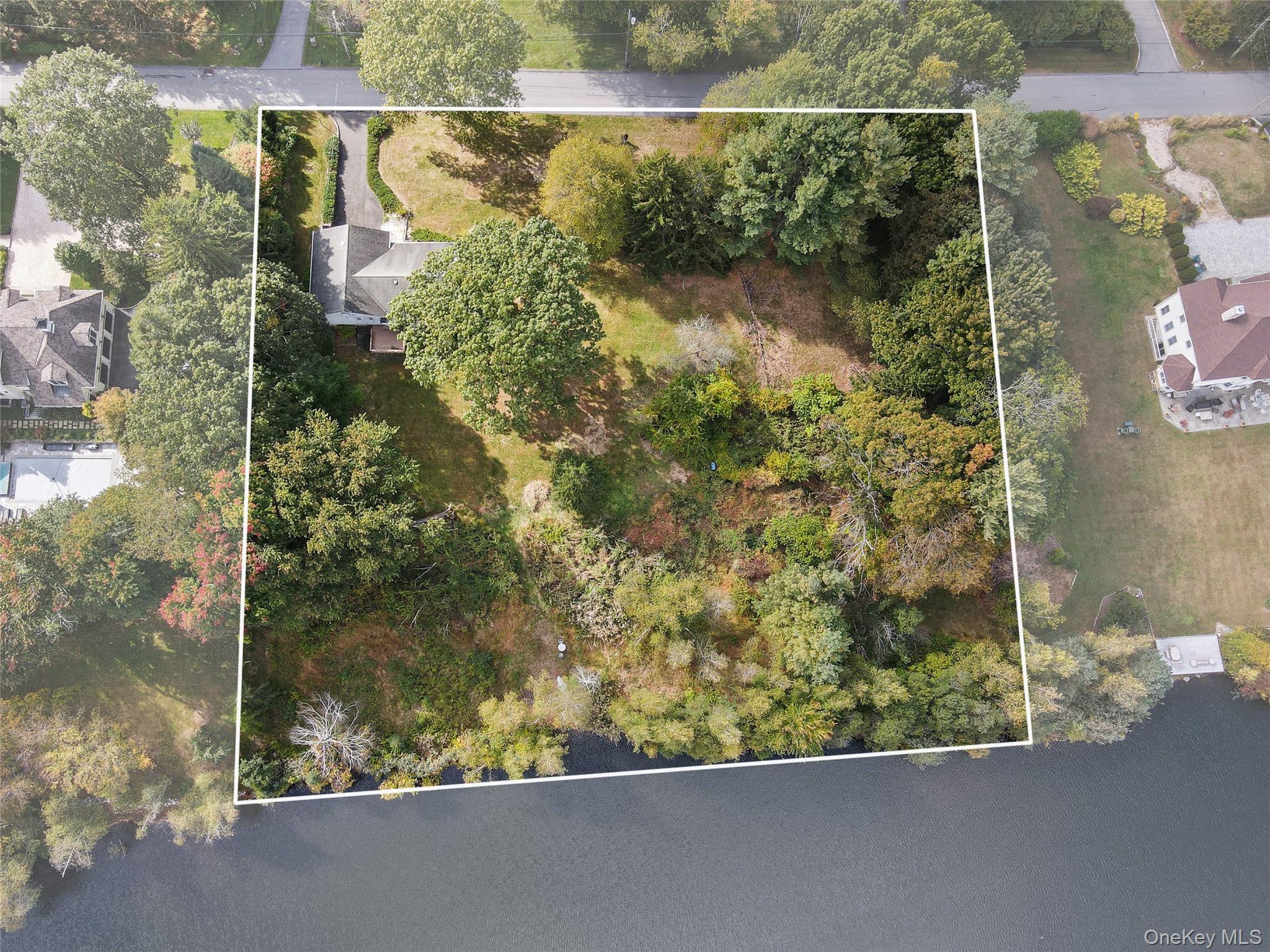 76 Byram Ridge Road Armonk, NY 10504 - Photo 5 of 11 a view of a lake from a balcony