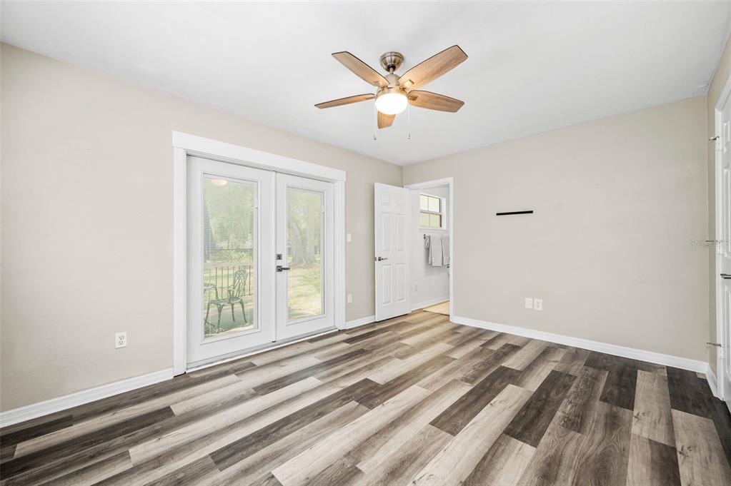 6820 Southwest 78th Street Gainesville, FL 32608 - Photo 17 of 41 a view of a livingroom with a ceiling fan