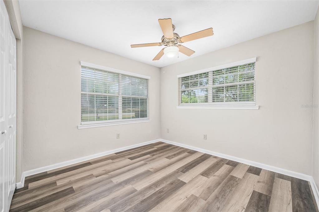 6820 Southwest 78th Street Gainesville, FL 32608 - Photo 19 of 41 an empty room with a window