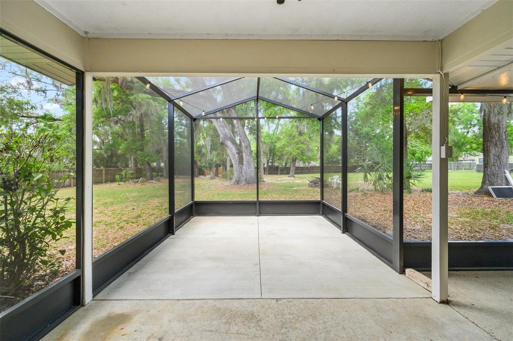 6820 Southwest 78th Street Gainesville, FL 32608 - Photo 27 of 41 a view of a large window with an outdoor space