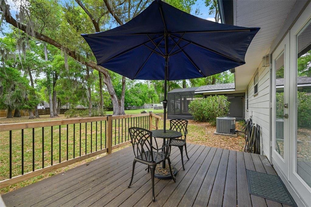 6820 Southwest 78th Street Gainesville, FL 32608 - Photo 31 of 41 a view of balcony with furniture and wooden deck