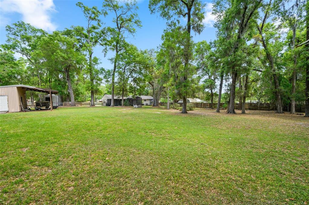 6820 Southwest 78th Street Gainesville, FL 32608 - Photo 34 of 41 a view of green field with trees